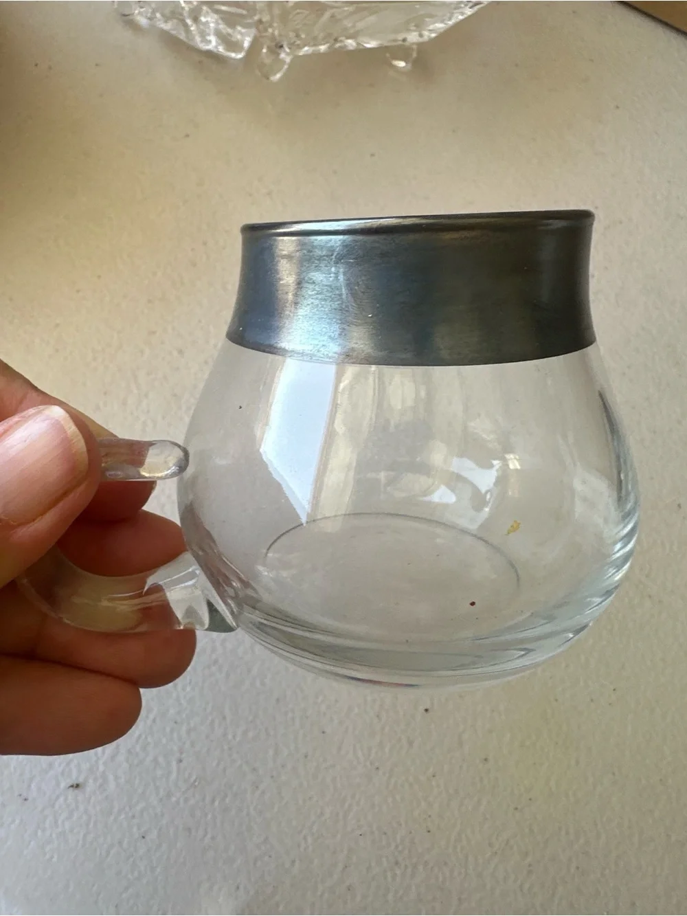This mid-century modern Dorothy Thorpe silver-banded creamer and sugar bowl set